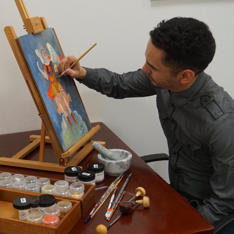 artist Ivan Calderon painting